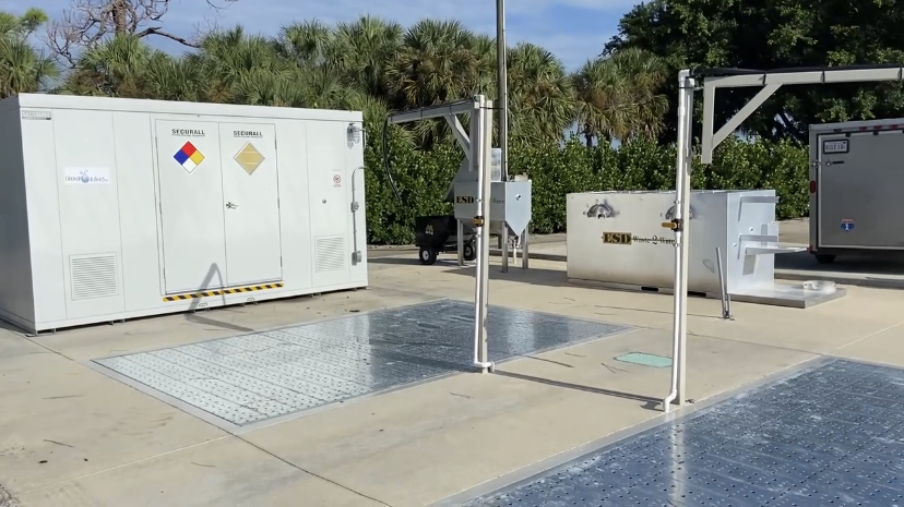 Chemical mix and load station with ESD wash water recycling units