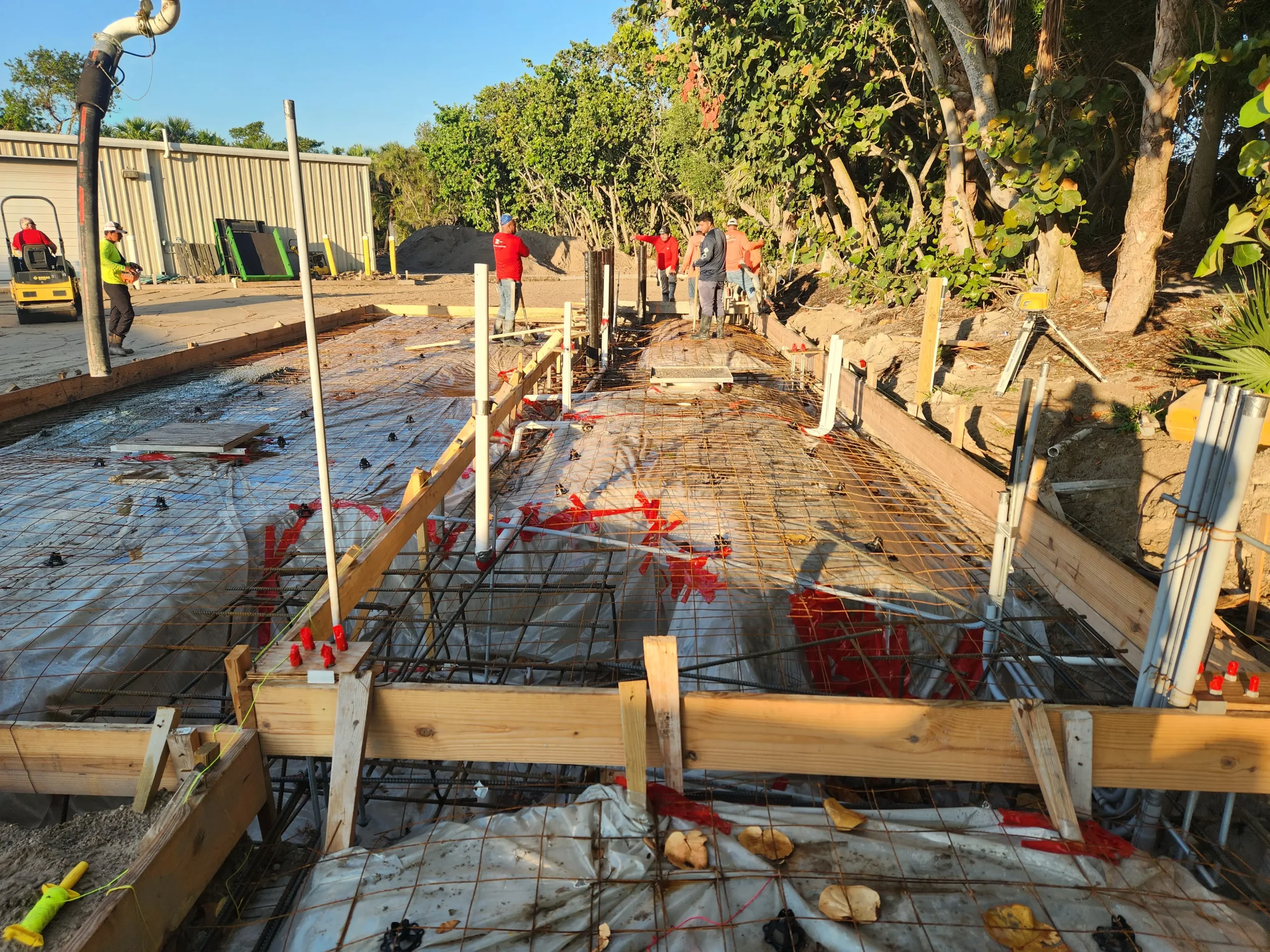 Rebar and formwork for poured concrete slab foundation