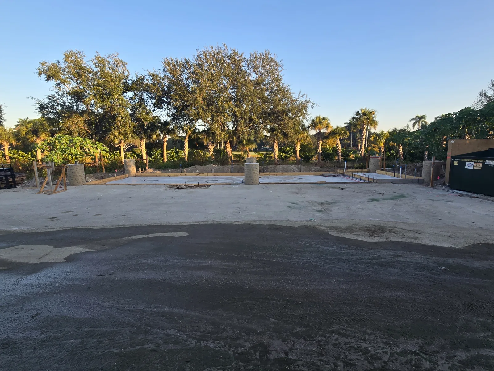 Graded and prepared site for the wash pad with concrete column footings and formwork in place