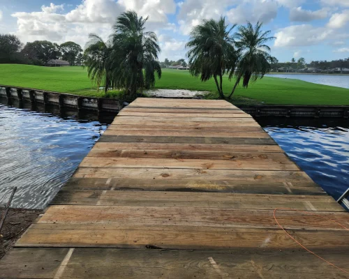 East Point new wood plank bridge walkway over water between fairways